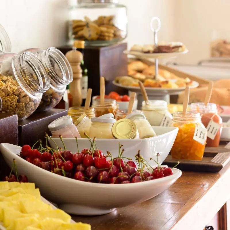 Gourmet breakfast buffet with fresh fruit and pastries in Mendoza.