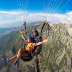 Paragliding flight at the foot of the Andes