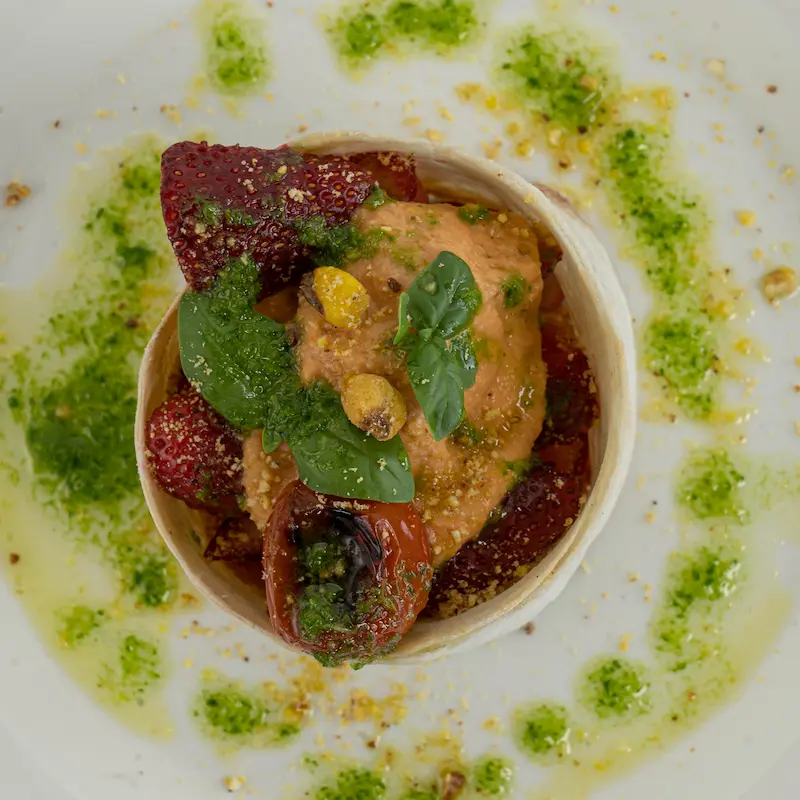 A fresh and colorful starter that blends savory and sweet notes.