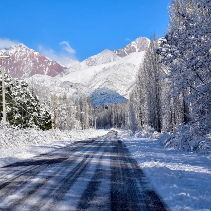 Scenic winter road to Uspallata after fresh snowfall