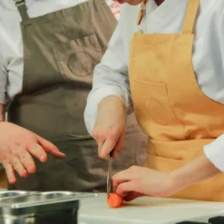Chef preparing ingredients during Mendoza cooking class at Finca Bandini